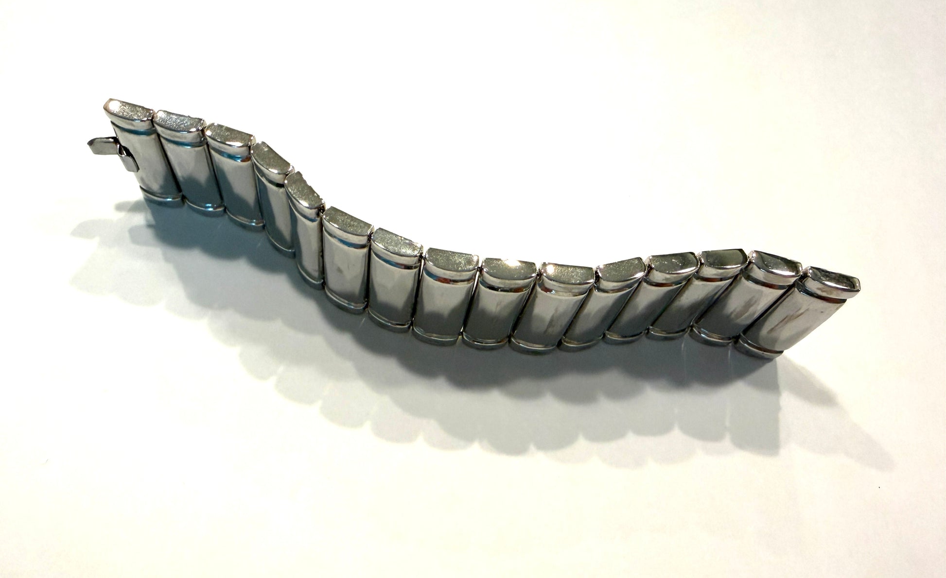 St. John silver metal bracelet with cylindrical links with hallmark 