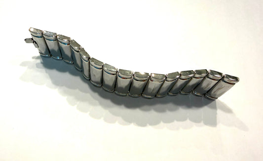 silver metal bracelet with cylindrical links with hallmark 