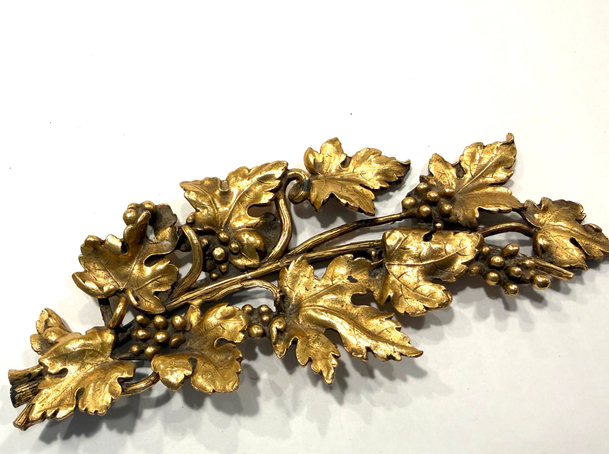 Bronze Grape Decorating Gilded Leaf With Cluster Berries