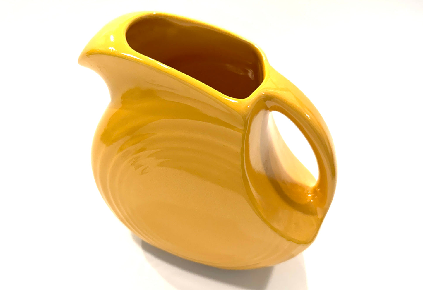 A Vintage Fiesta Mustard Yellow Ceramic Pitcher Made In USA