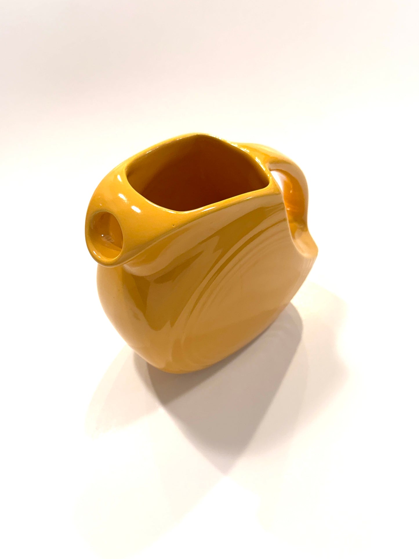 A Vintage Fiesta Mustard Yellow Ceramic Pitcher Made In USA