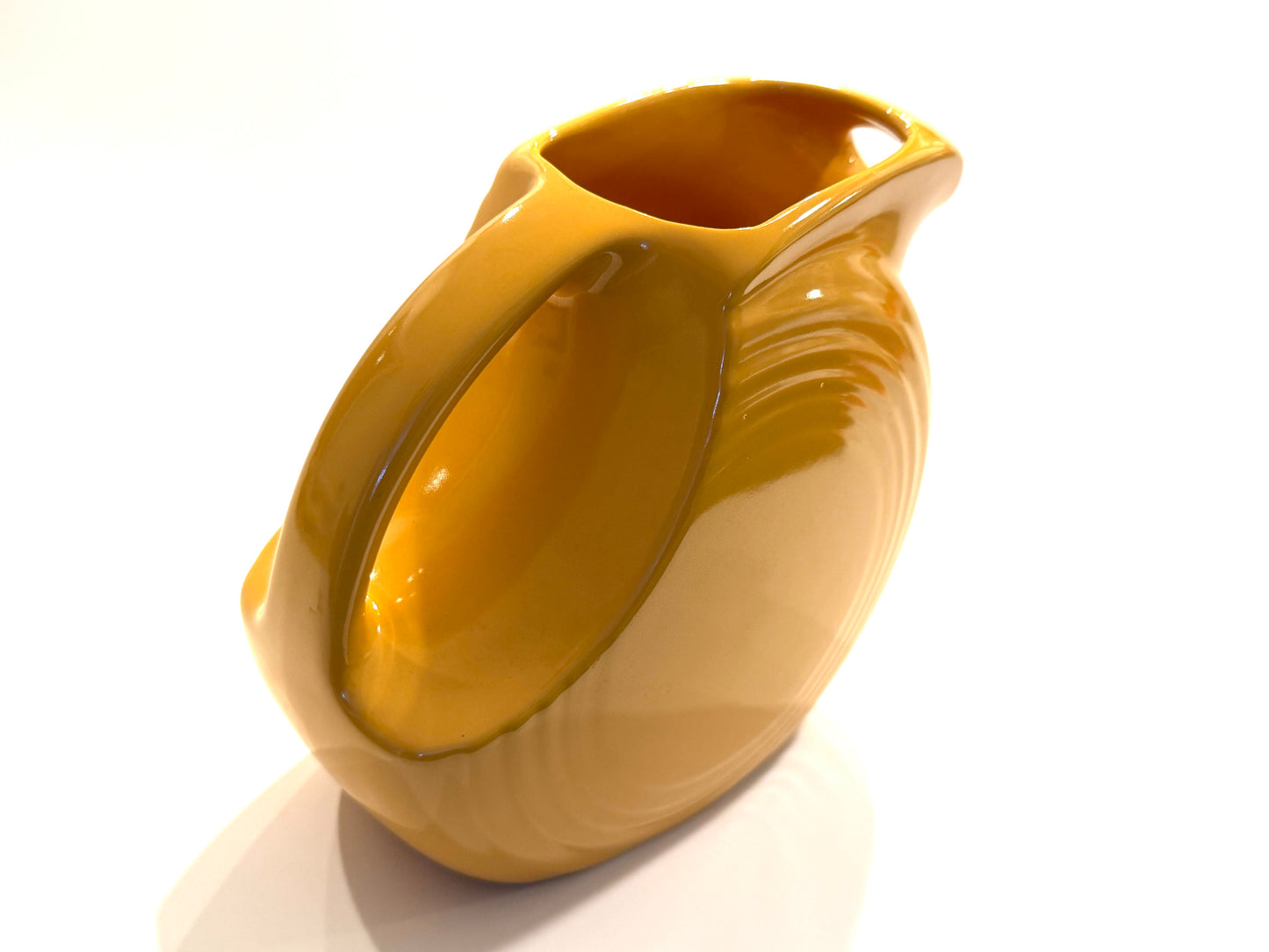 A Vintage Fiesta Mustard Yellow Ceramic Pitcher Made In USA