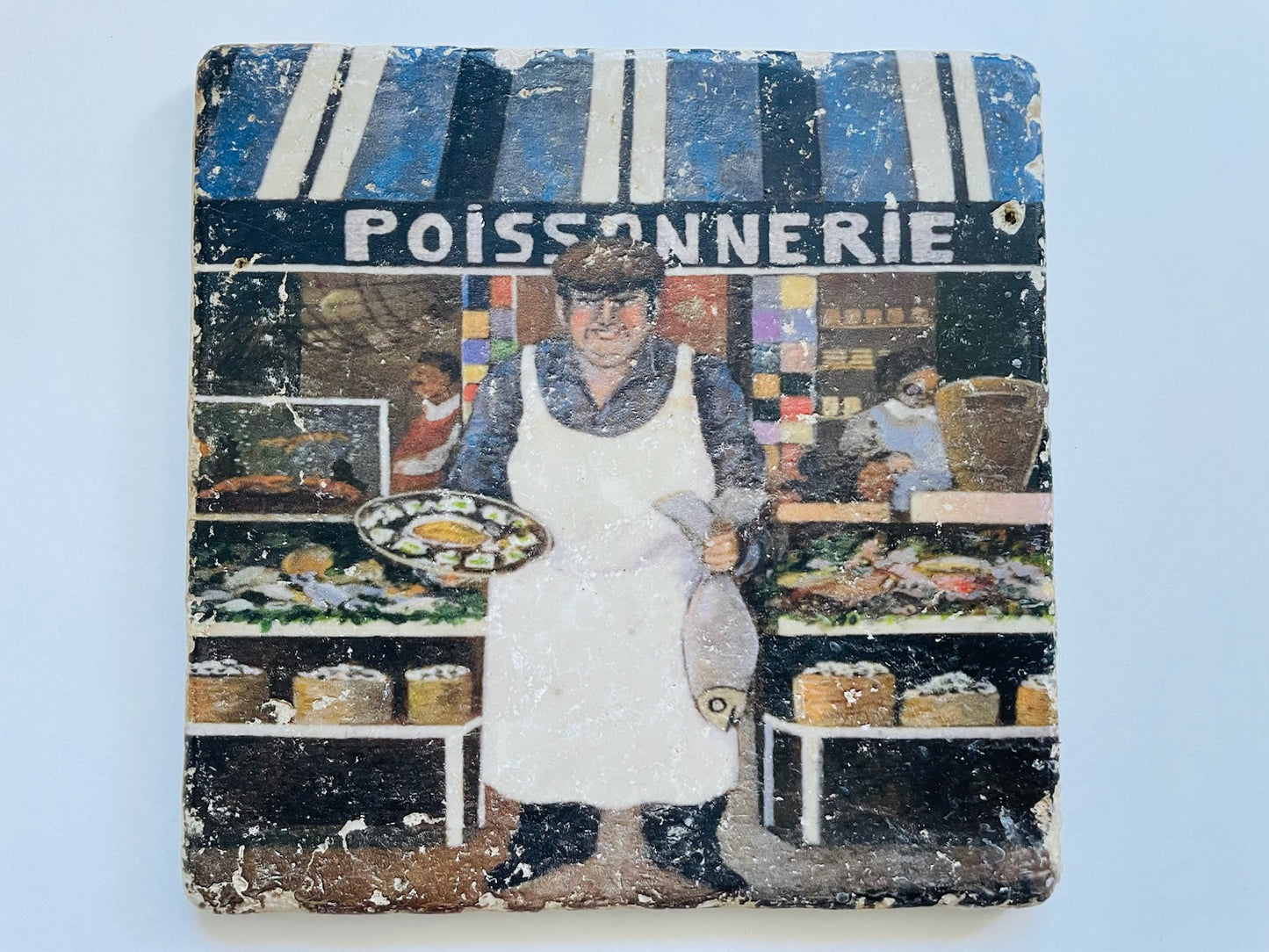 Decorative tile with a fishmonger and 'Poissonnerie' sign attribute French artist Guy Bufett