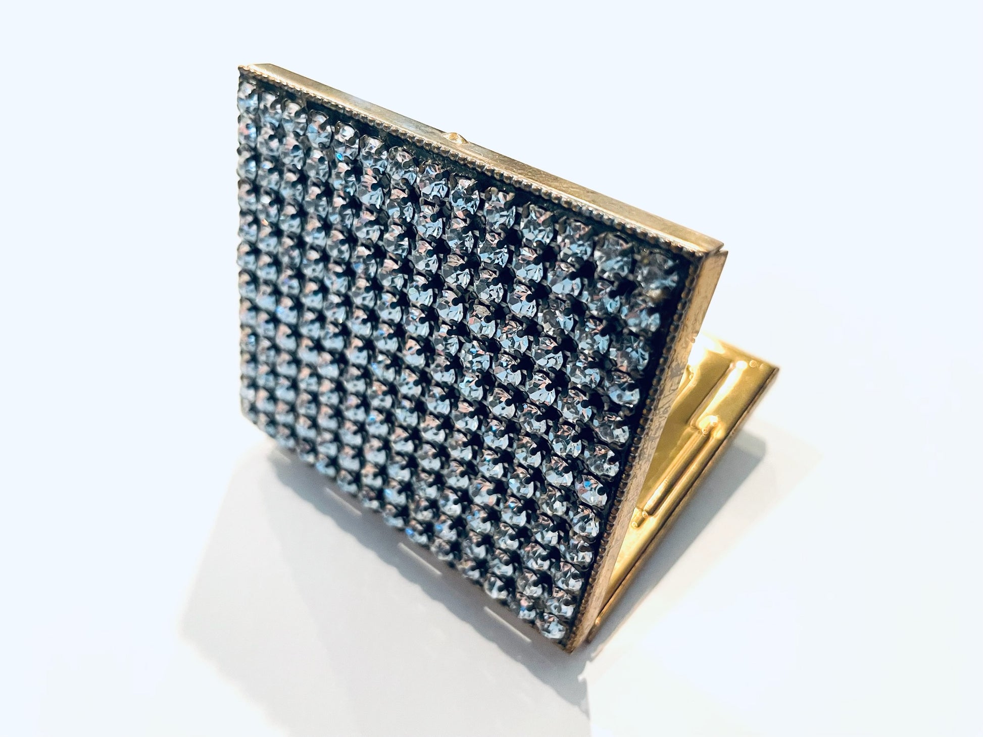 A Mid Century Modern Embellished Crystals Powder Compact