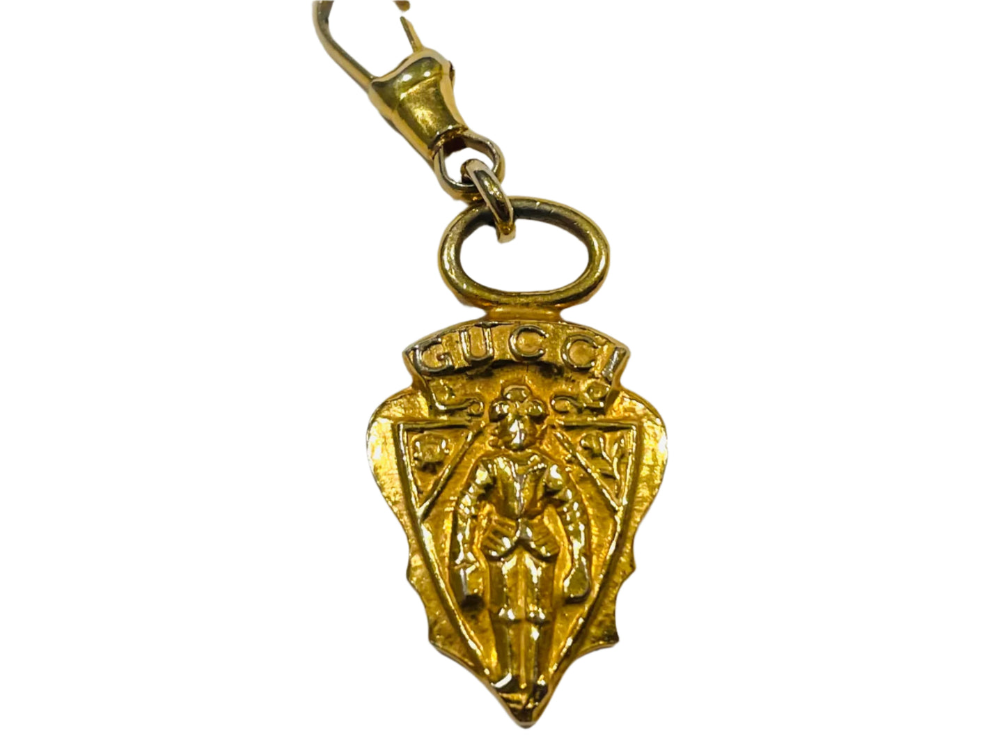 A Vintage Gucci Gold Tone Armour Knight Pendant Charm