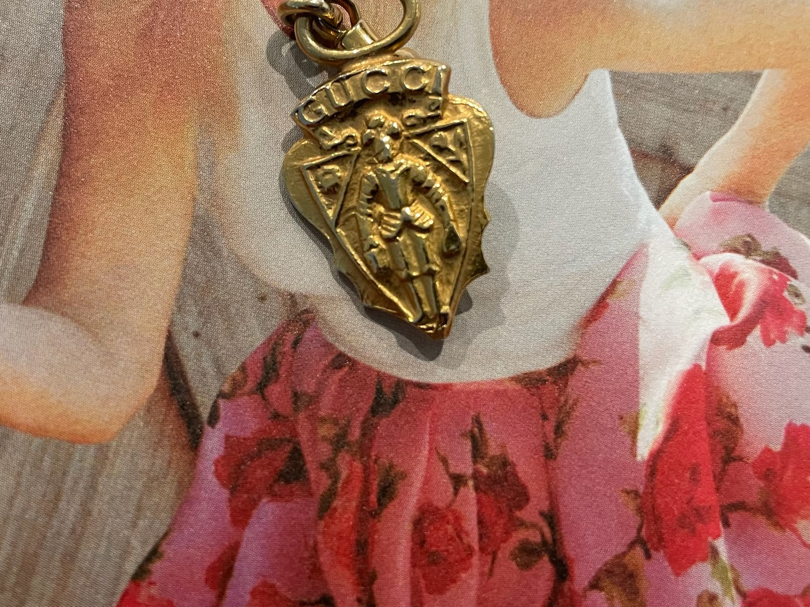 A Vintage Gucci Gold Tone Armour Knight Pendant Charm