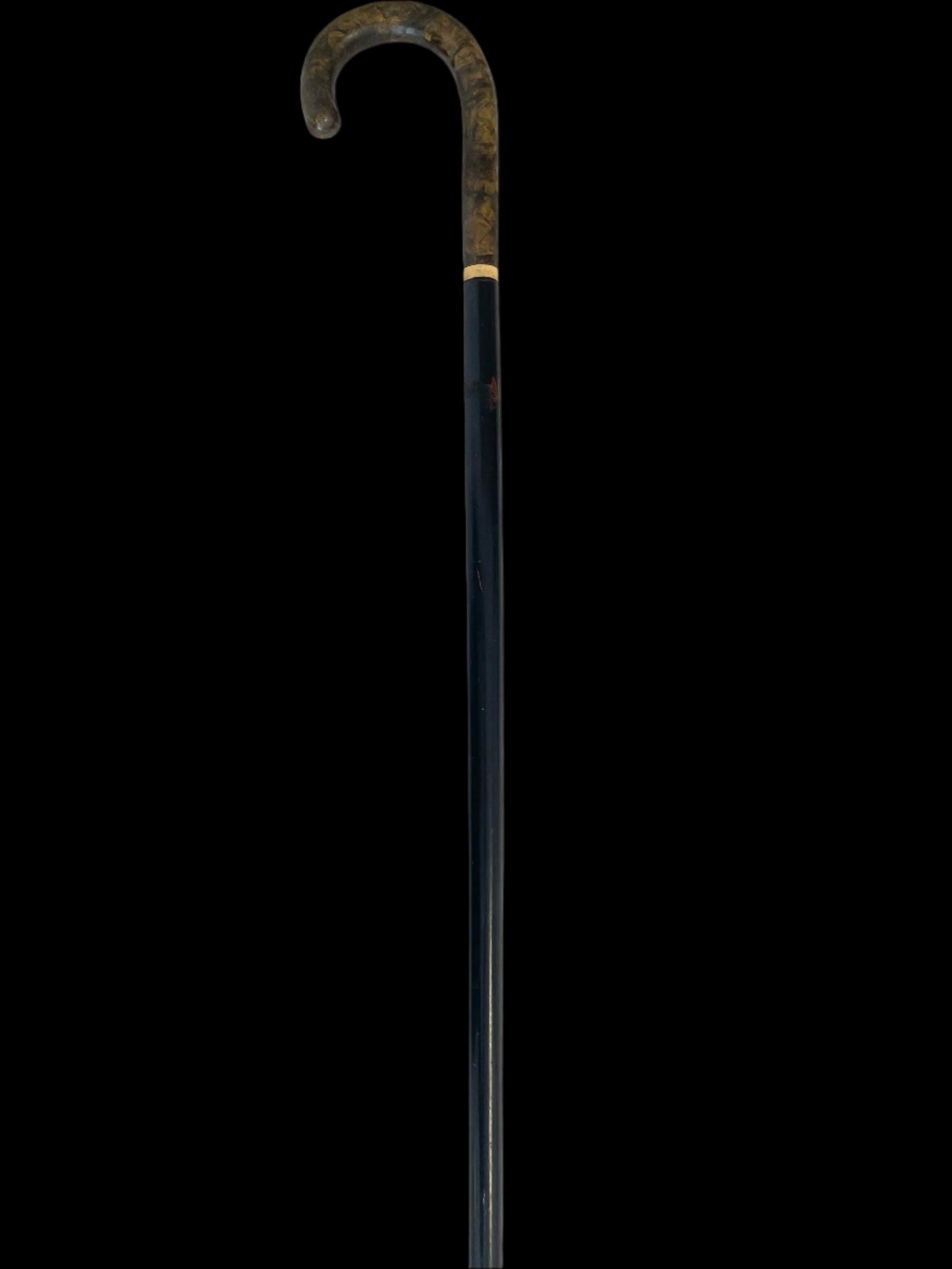 Black walking cane with a curved  tortoise style handle 