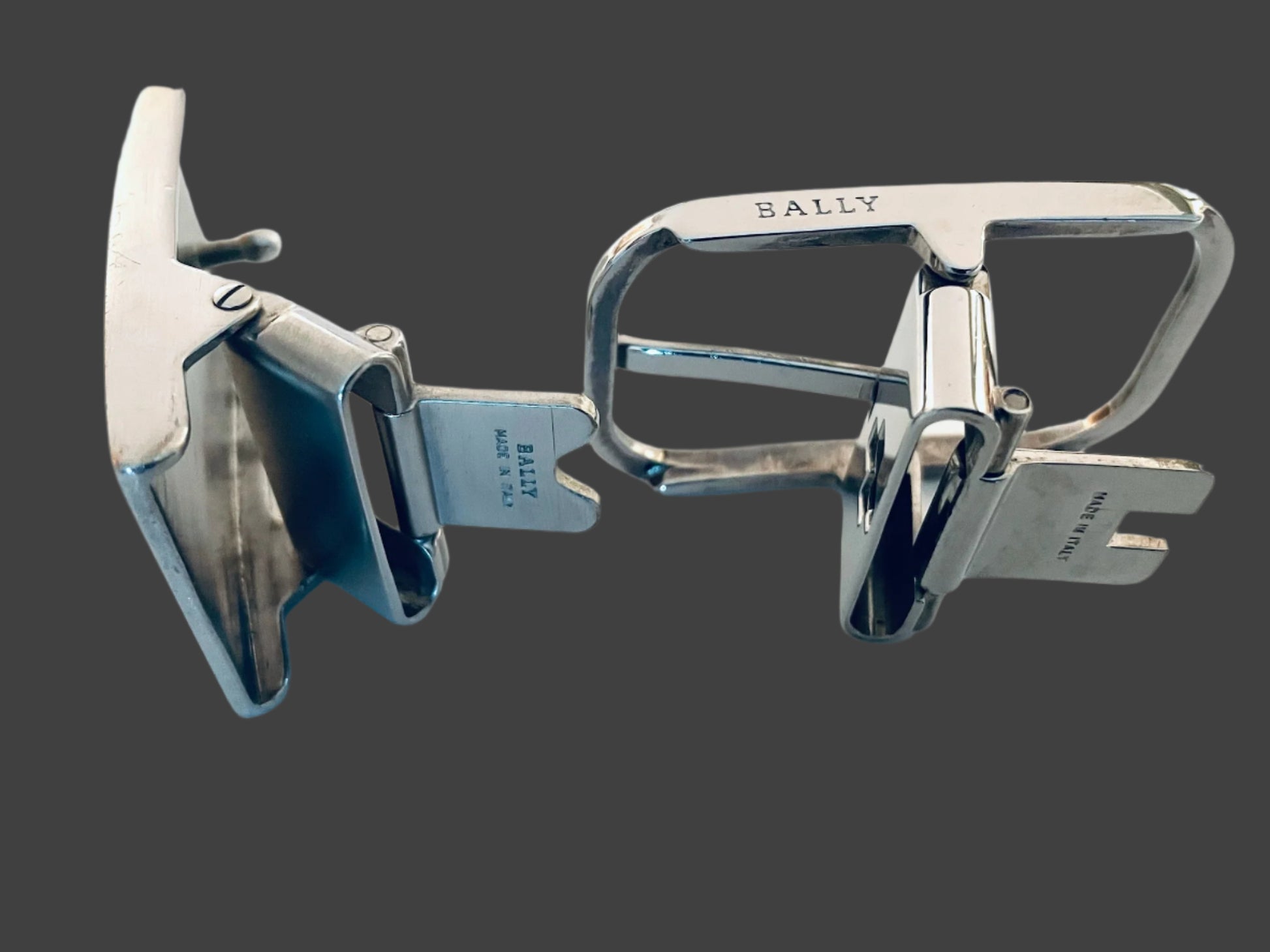 Two Silver Metal Belt Buckles By Bally Made In Italy 