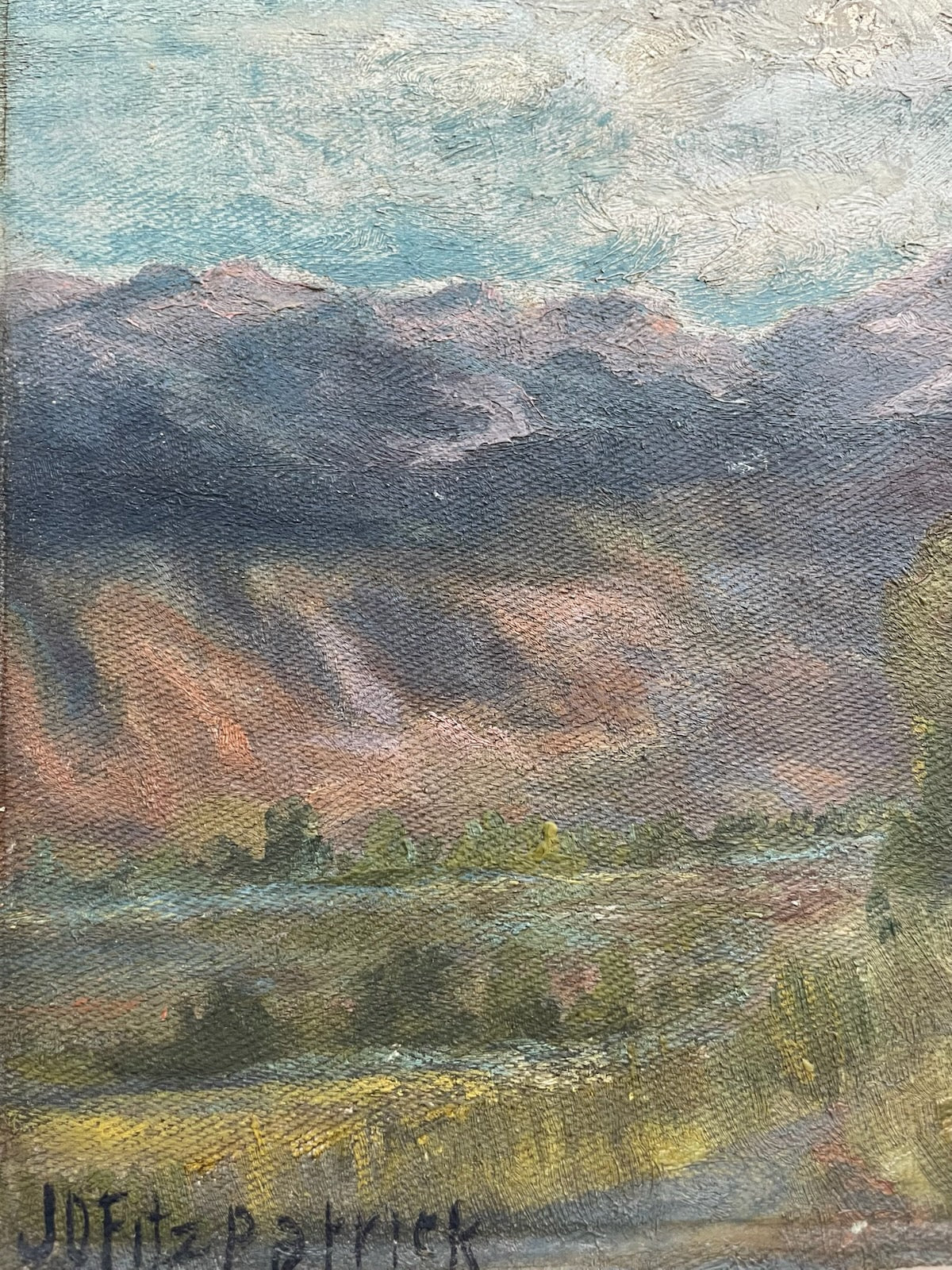 Painting of a mountain landscape with a signature at the bottom left corner by jd Fitzpatrick 