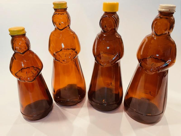 Aunt Jemima Various Sizes Six Brown Glass Bottles Caps Relief Marked