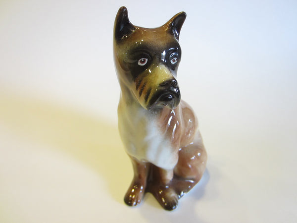 A Seated Brown Ceramic Boxer Statue Marked M53