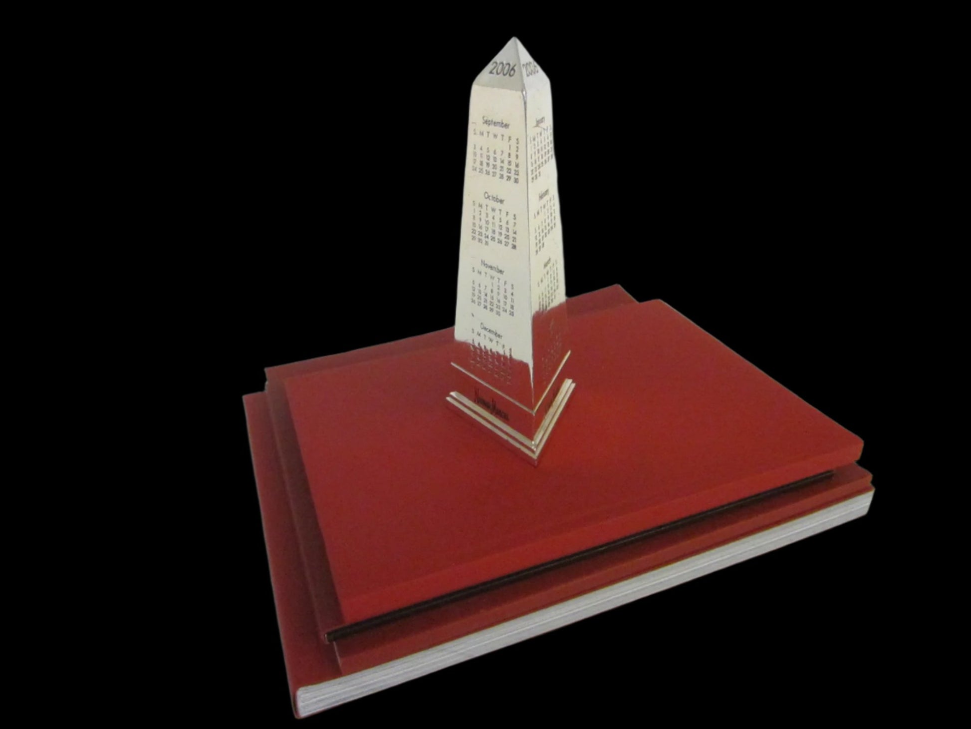 Obelisk Nickel Paperweight 2006 Calendar Neiman Marcus Exclusive - Designer Unique Finds 
