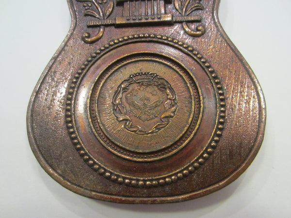 A Copper Vintage Guitar Thermometer