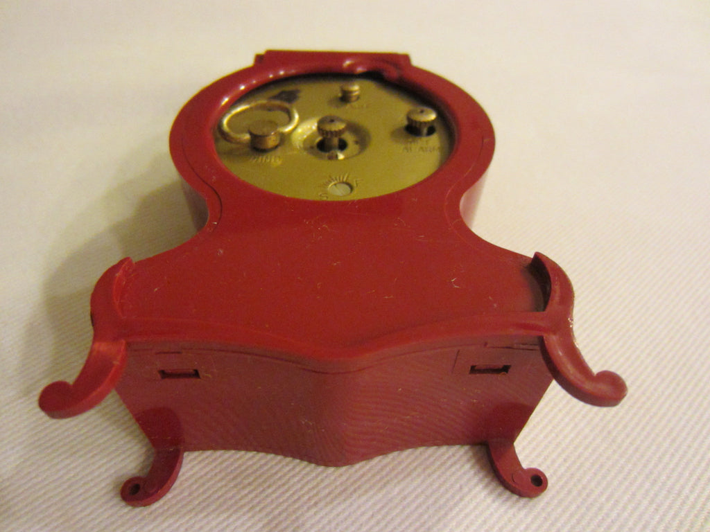 Westclox Burgundy Mantle Clock Hand Wind Alarm Footed Floral Medallion